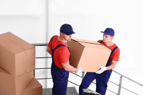 Man and van team separating recyclable items in Sidcup