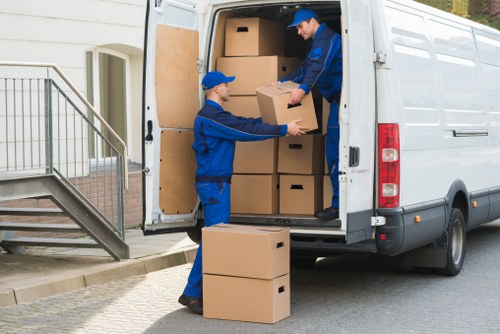 Professional man and van crew completing a careful move in Sidcup